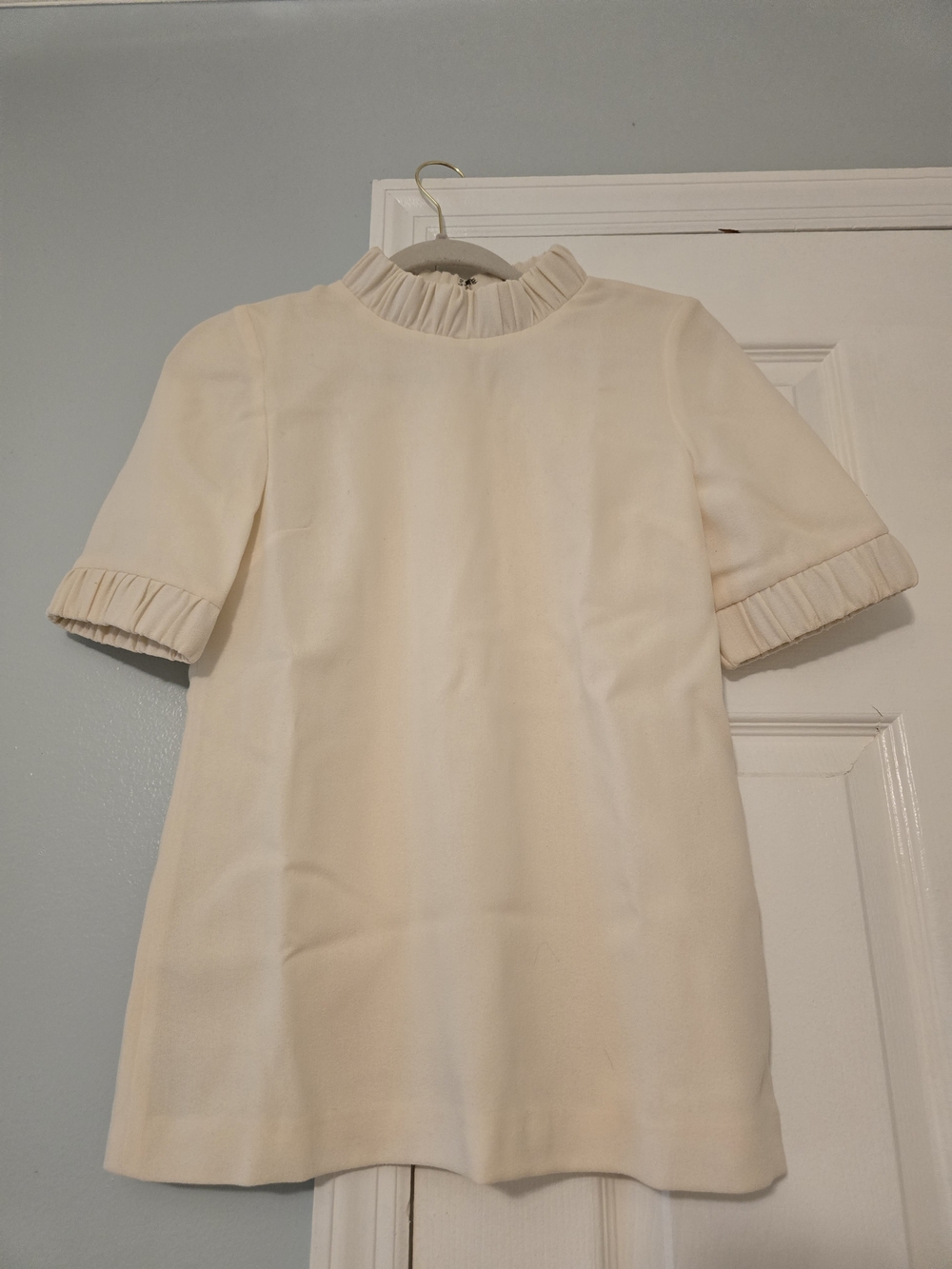 Goat Cream Ruffle-Neck Top